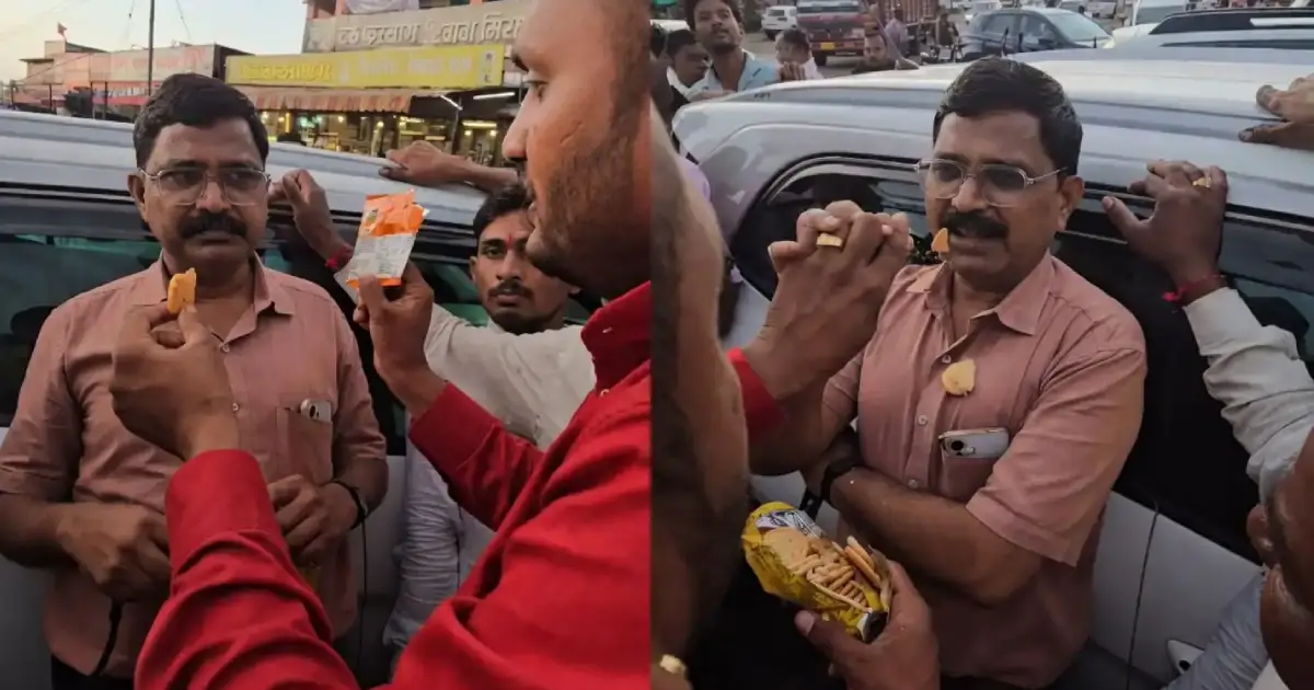കടയുടമയെ സംരക്ഷിക്കാൻ കൈക്കൂലി വാങ്ങി; ഭക്ഷ്യസുരക്ഷാ ഉദ്യോഗസ്ഥന്റെ വായിൽ കാലാവധി കഴിഞ്ഞ ബിസ്കറ്റ് തിരുകി ജനക്കൂട്ടം