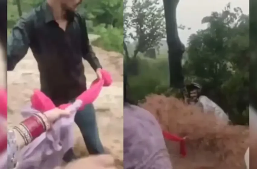  ദുപ്പട്ടകൾ കൂട്ടിക്കെട്ടി ജീവൻരക്ഷാ കയറാക്കി; മിന്നൽ പ്രളയത്തിൽപ്പെട്ട ബൈക്ക് യാത്രികനെ സാഹസികമായി രക്ഷിച്ച് യുവതിയും കുടുംബവും; സോഷ്യൽ മീഡിയയിൽ വൈറലായി വീഡിയോ