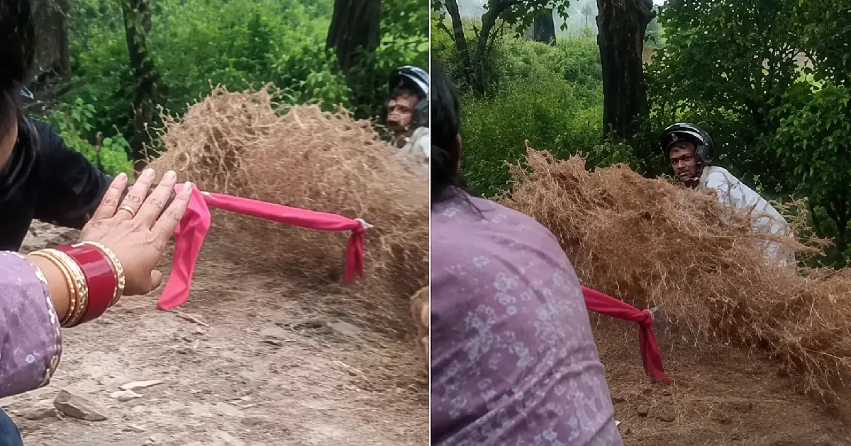 കുത്തിയൊഴുകുന്ന വെള്ളത്തിൽ കുടുങ്ങി ബൈക്ക് യാത്രികൻ; ഷാളുകൾ കൂട്ടിക്കെട്ടി യുവാവിനെ കരകയറ്റി യാത്രാസംഘം