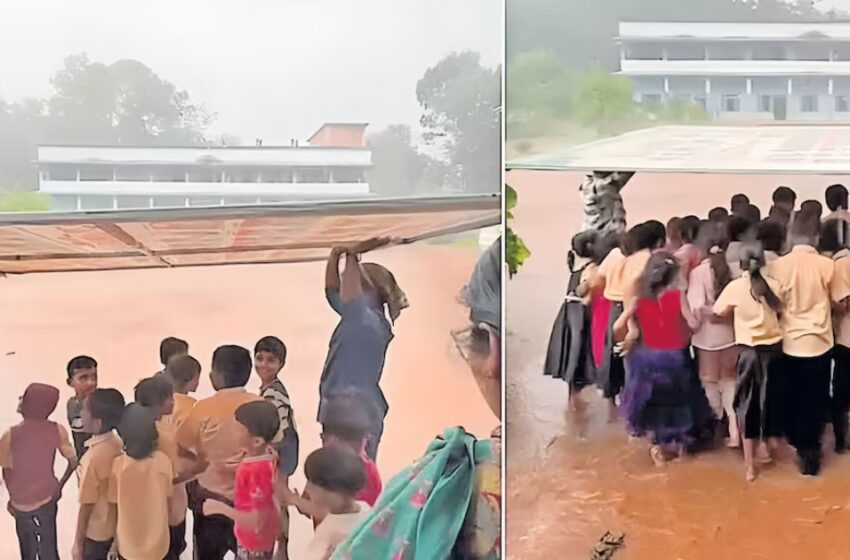  കുട്ടികളെ മഴ നനയാതെ ക്ലാസിലെത്തിക്കാൻ ഫ്ലെക്സ് ബോർഡ് കുടയാക്കി അധ്യാപകൻ; വൈറലായി വണ്ടൂരിലെ മാഷിന്റെ കരുതൽ